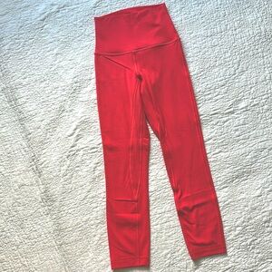 Coral color Lululemon Wundertrain leggings. Size 0